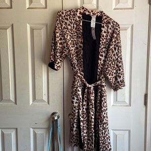 Beautiful animal print ruana. Never worn. Price is negotiable